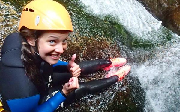 a Girl taking part in a body rafting