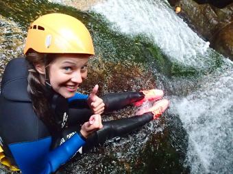 a Girl taking part in a body rafting